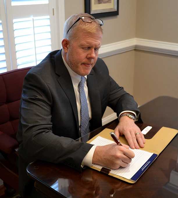 Defense attorney Matt Crosby working at his desk
